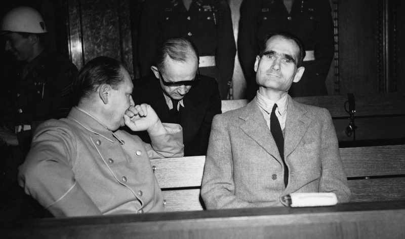 Goering, left, and Hess, right, in court during their trials, 4 December 1945.